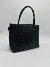 Load image into Gallery viewer, Authentic Chanel preowned black caviar medallion tote with silver hardware