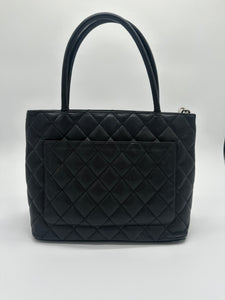 Authentic Chanel preowned black caviar medallion tote with silver hardware