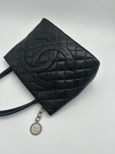 Load image into Gallery viewer, Authentic Chanel preowned black caviar medallion tote with silver hardware